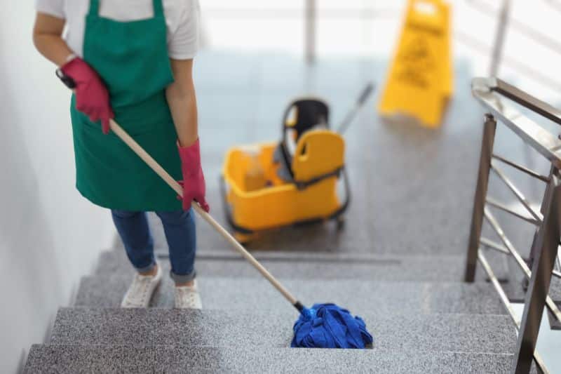 professional cleaning, cleaning the stairs using a mop