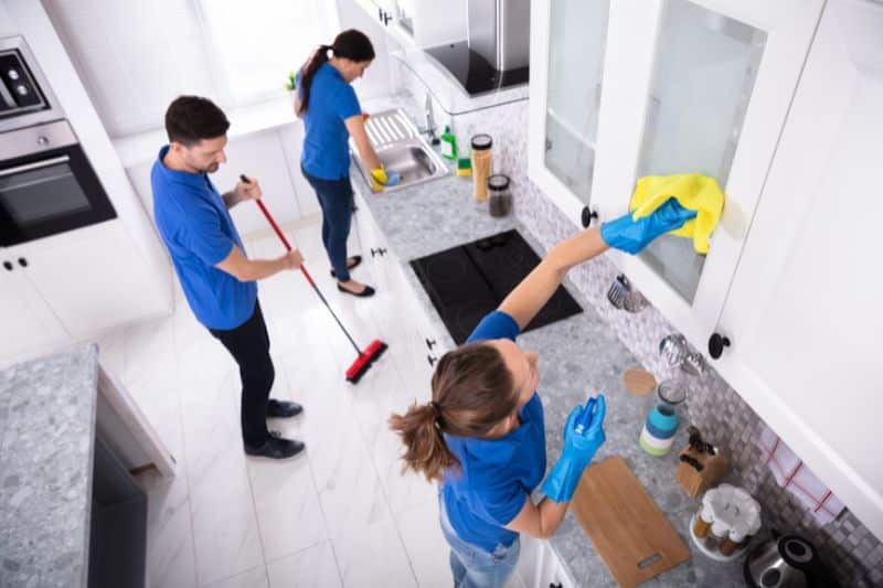 a professional cleaning services, cleaning the kitchen