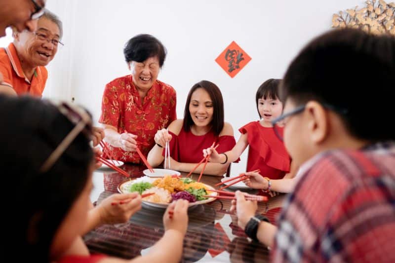 families gather for a big reunion dinner